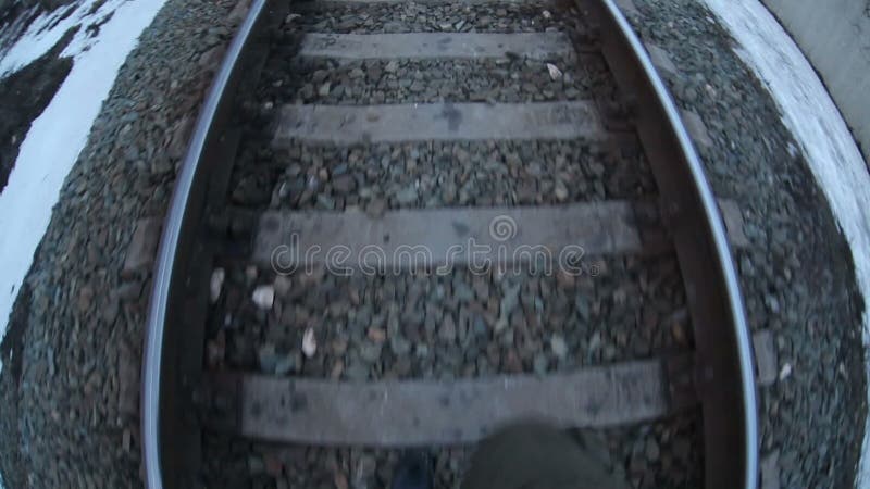 Man walks by rail journey legs in boots video