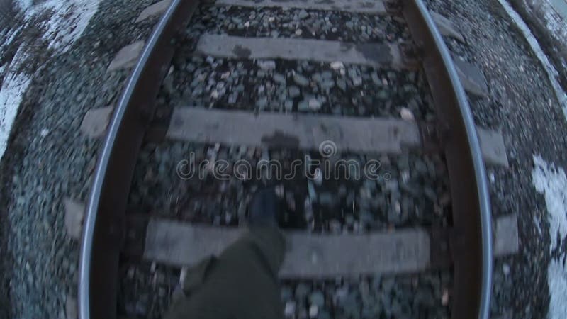 Man walks by rail journey legs in boots video