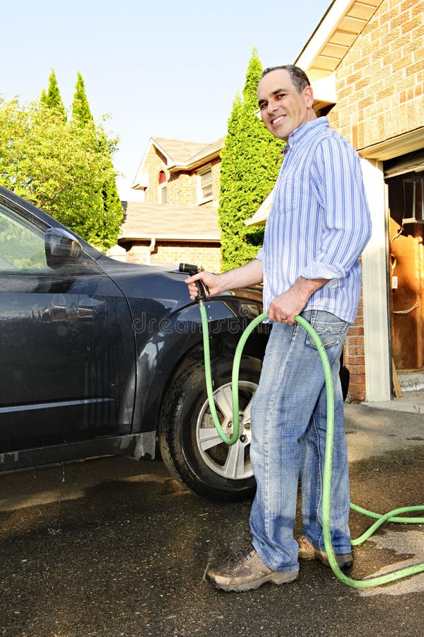 Man Washing Car on Driveway Stock Image Image of automobile, chores