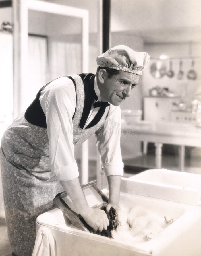 Man Washing Clothes in the Kitchen Sink Stock Image Image of 19101940