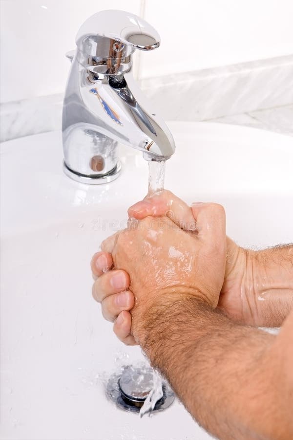 Man washing his hands stock image. Image of bathroom 14324943