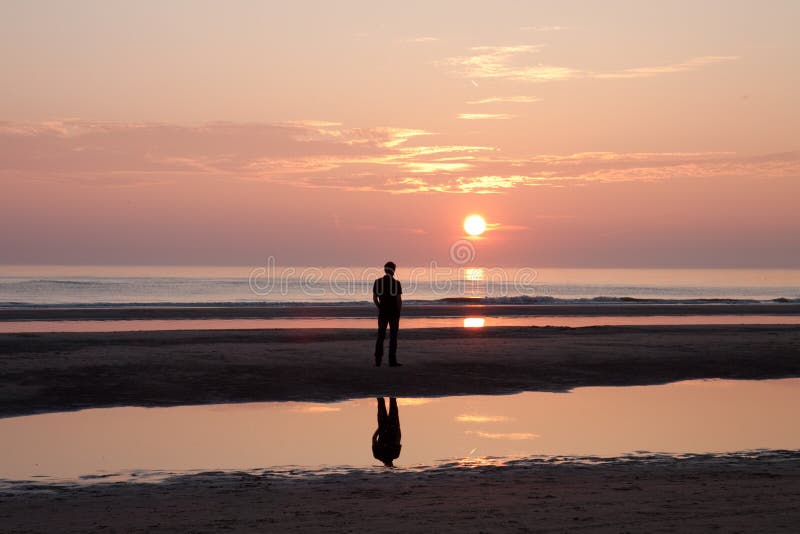 Man watching at the sunrise