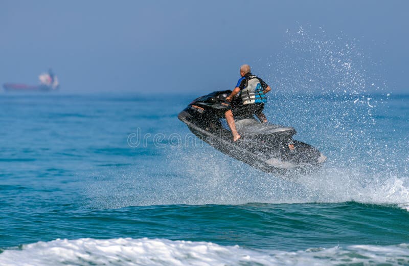 A Man on a Water Motorcycle on the Sea Editorial Photography Image of