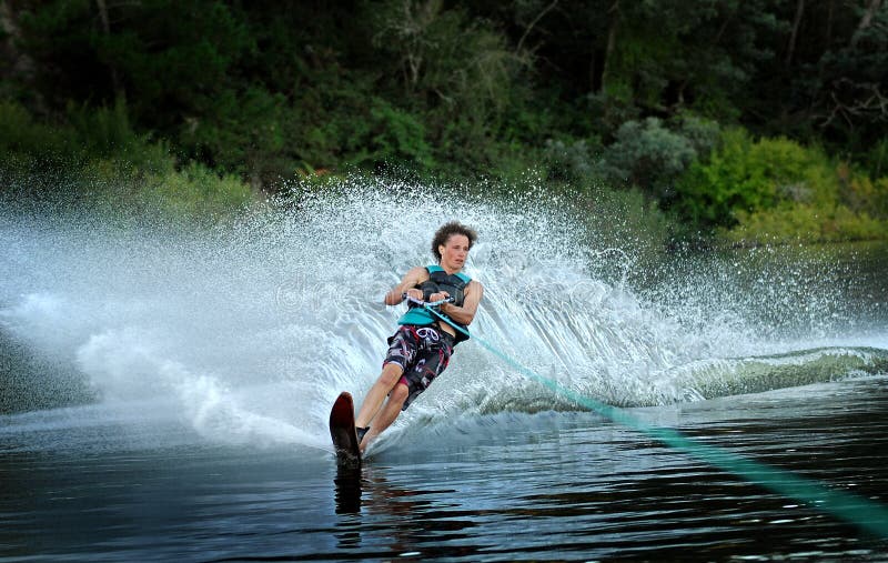 Man water skiing on lake stock photo. Image of skiing 67189590