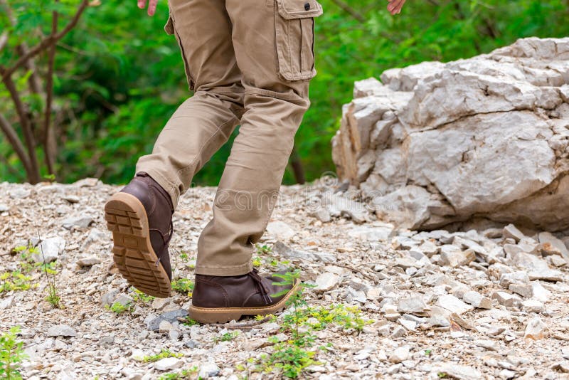 Man Wearing Cargo Pants and Climbing on the Rock Stock Photo Image of