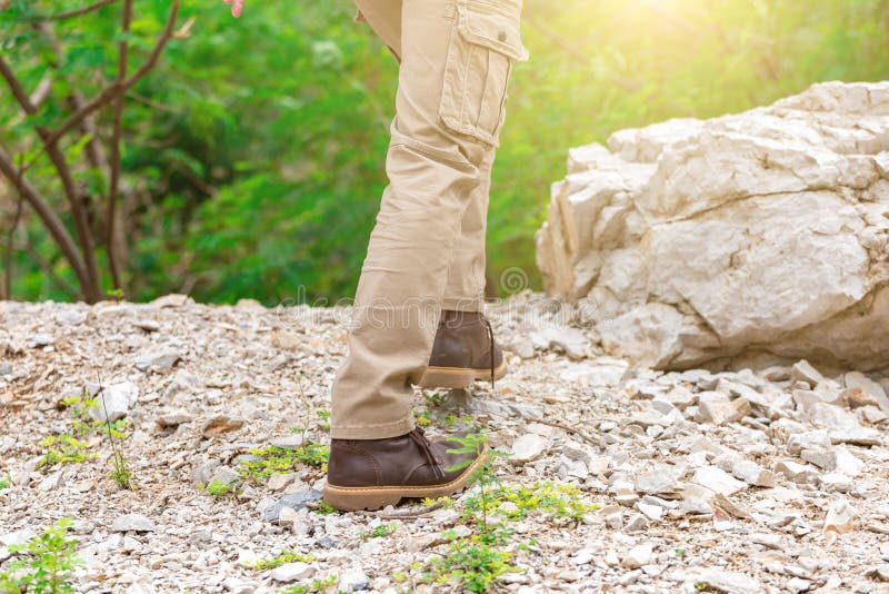 Man Wearing Cargo Pants and Climbing on the Rock Stock Photo Image of