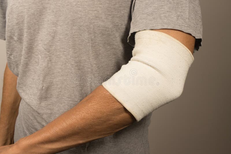 Man Wearing an Elastic Bandage on His Elbow Stock Photo Image of