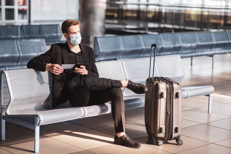 Man Wearing a Face Mask while Staying in the Airport Stock Image Image of covid19, connection
