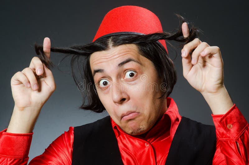 Man wearing red fez hat stock photo. Image of clothing 62705192