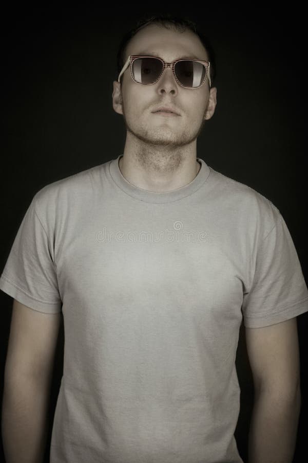 Man Wearing Sunglasses On Black Background