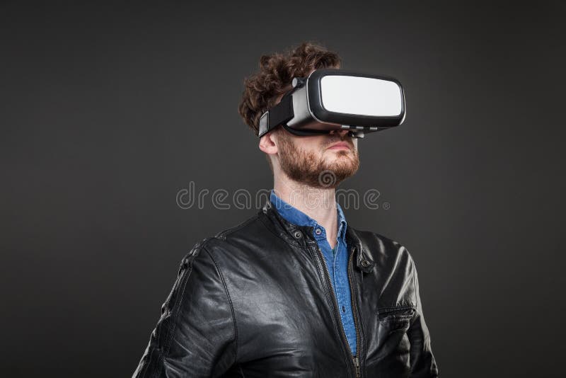 Man wearing virtual reality goggles stock photos Man wearing virtual reality goggles stock photos