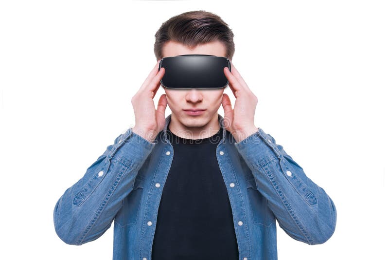 Man wearing virtual reality goggles isolated on white background stock images Man wearing virtual reality goggles isolated on white background stock images