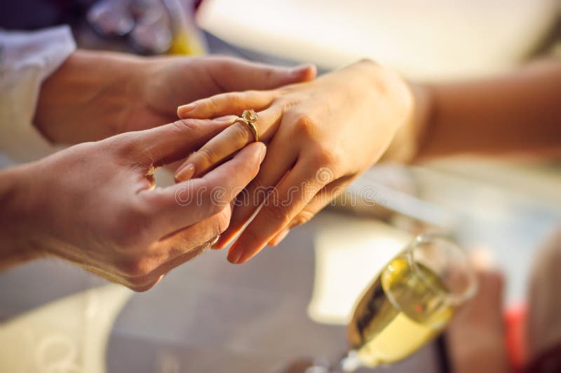 The Man Wears a Wedding Ring on Woman S Hand Stock Image Image of