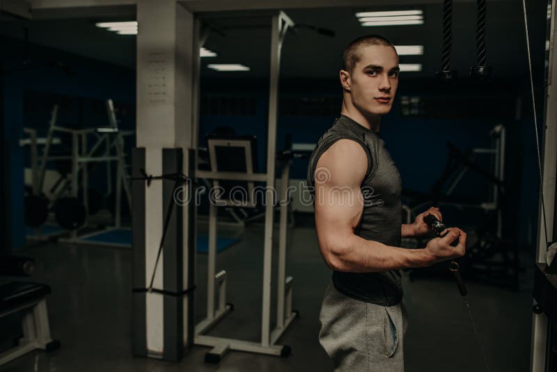 Man with Weight Training in Gym Equipment Sport Club Stock Image - Image of  hold, human: 170007499