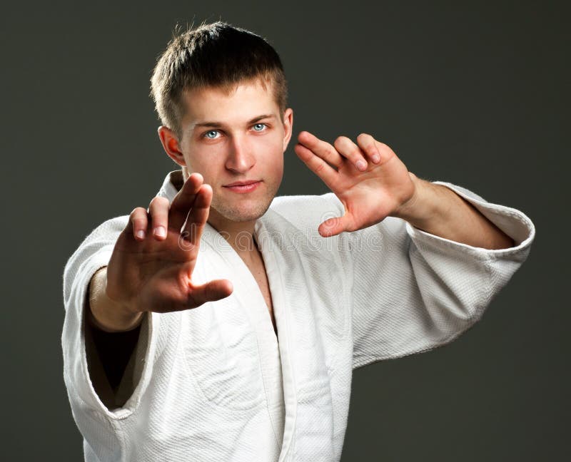 Man in a white kimono stock photo. Image of karate, sportsman - 38046658