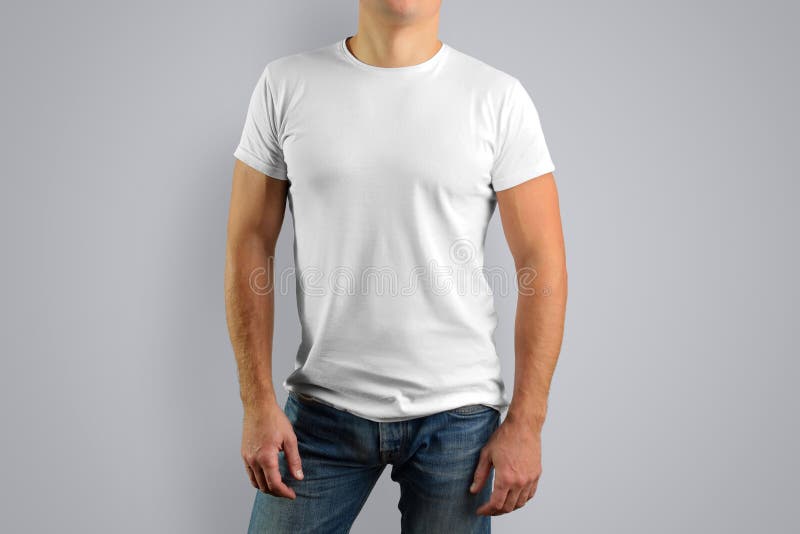 Man In A White T-shirt Is Isolated On A Gray Background. Stock Photo ...