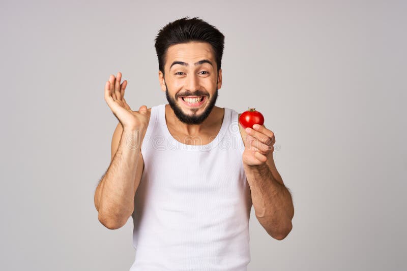 A Man in a White T-shirt Tomatoes in Hand Fresh Vegetables Health ...