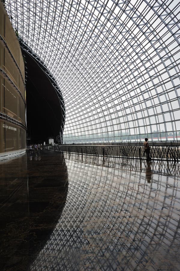 Man and windows in modern building in Beijing.