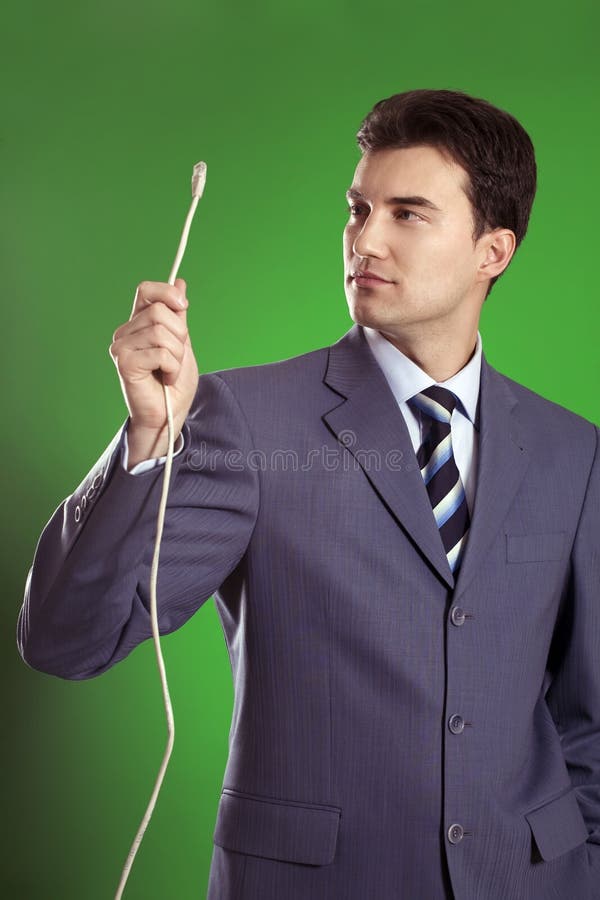 Man with wires in his hands stock photos