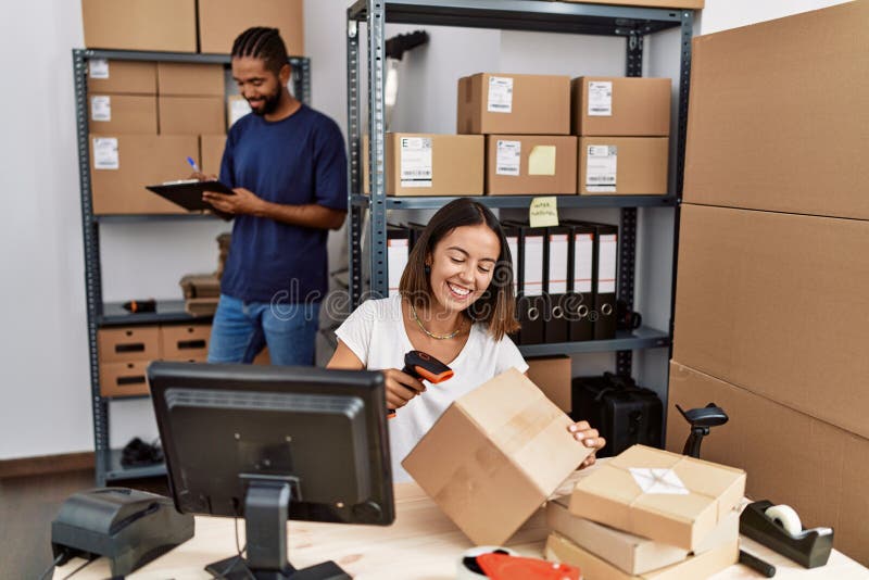 Man and Woman Business Partners Scanning Package Using Barcode Reader