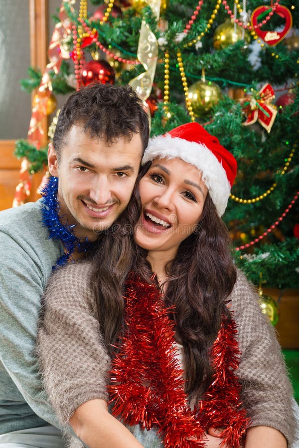 https://thumbs.dreamstime.com/b/man-woman-christmas-sharing-love-happiness-women-lovely-couple-xmas-tree-smiling-expressing-beautiful-holiday-64094521.jpg