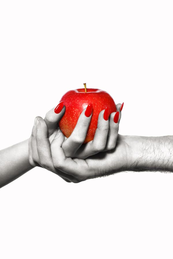 Man and woman hands holding forbidden fruit, selective coloring royalty free stock photos