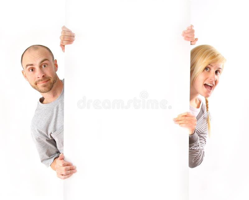 Man and woman holding white board