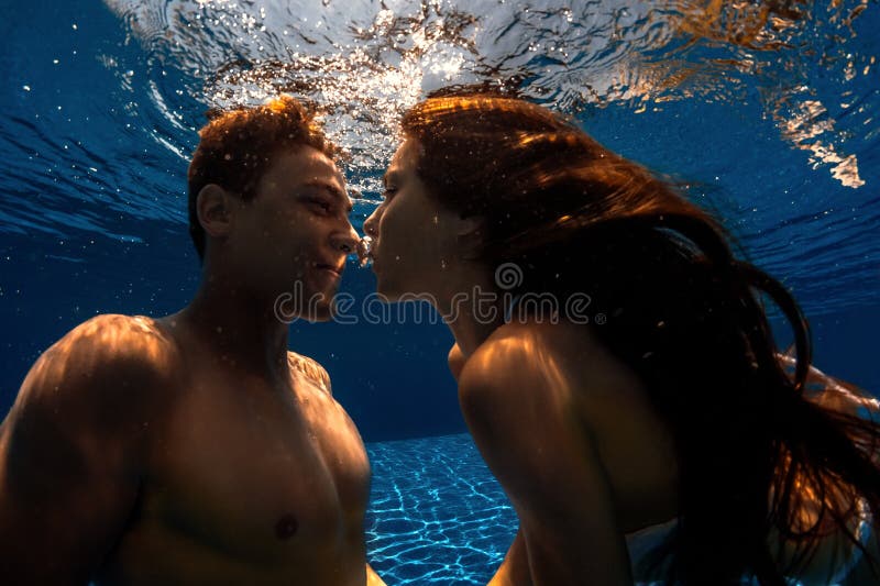 Girls Kissing In The Pool