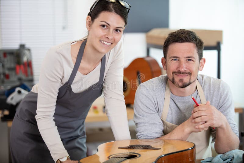 Man and Woman at Music Store Stock Image Image of acoustic