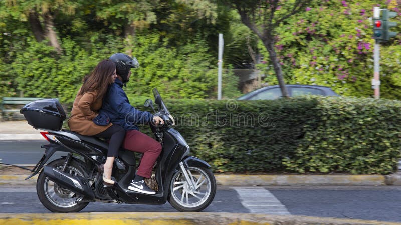 Woman with Brown Checkered Louis Vuitton Bag before Diesel Black