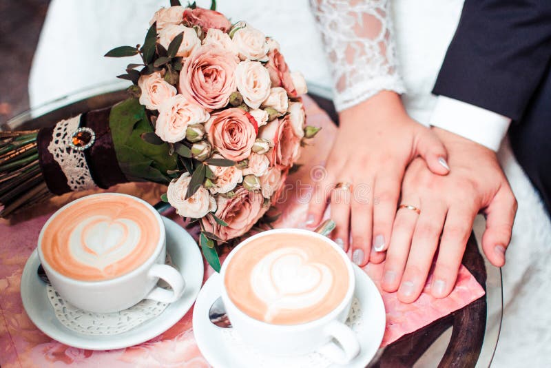 Man and woman's, coffee, bridal bouquet of flowers. royalty free stock images Man and woman's, coffee, bridal bouquet of flowers. royalty free stock images