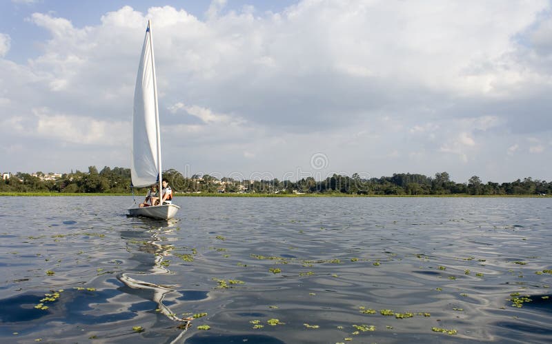 Man and Woman Sailing on Lake - Horizontal