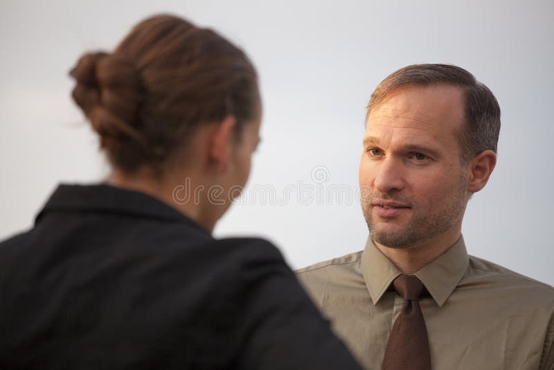 Man and woman talking