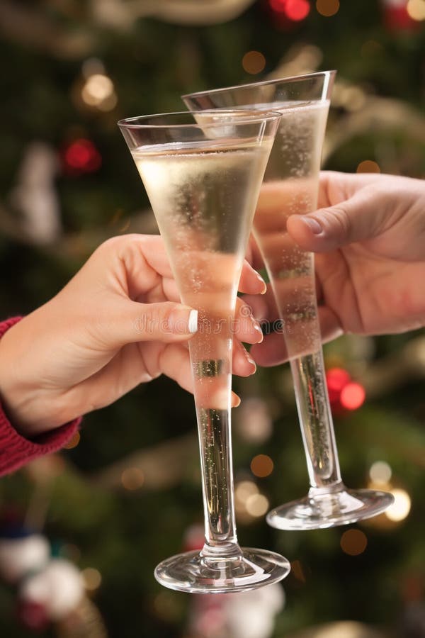 Man and Woman Toasting Champagne Flutes