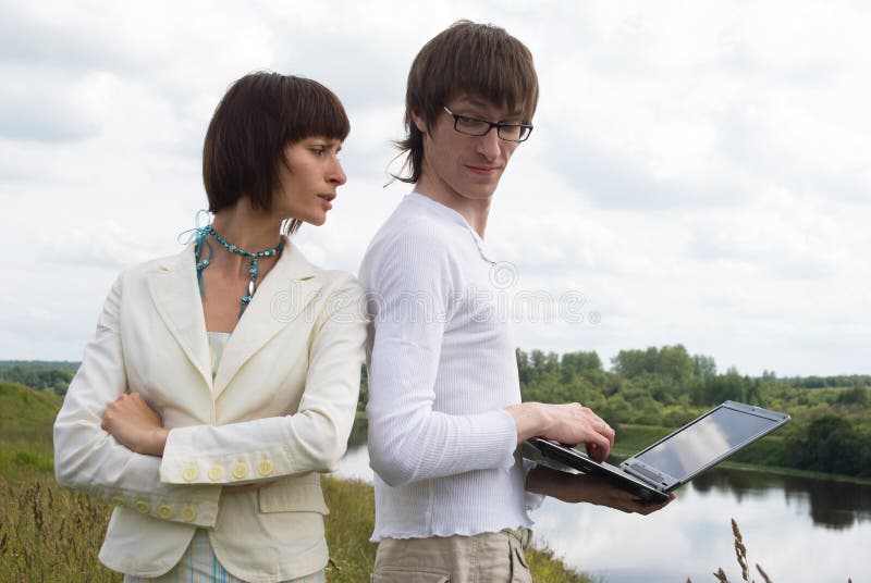 The man and women with laptop