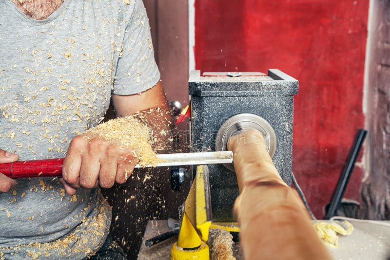 Man work on the lathe wood royalty free stock photos Man work on the lathe wood royalty free stock photos
