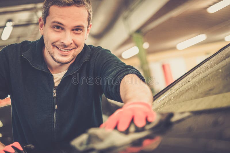 Man worker on car wash stock image. Image of manual, automobile 52690403