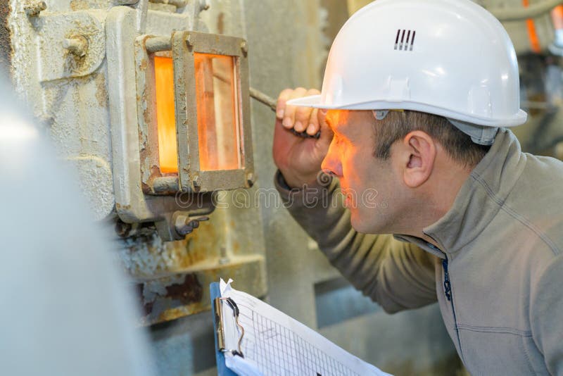 Man working in ceramic factory stock images