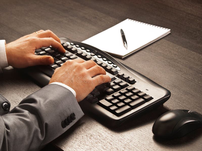 Man working with a keyboard and a mousse royalty free stock photos Man working with a keyboard and a mousse royalty free stock photos