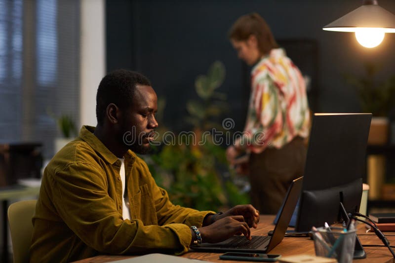 Man Working On Laptop In Eco Office royalty free stock photos