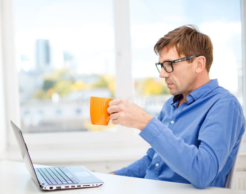 Man working with laptop at home