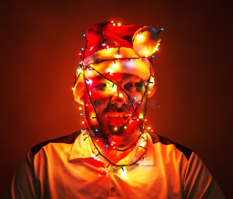 Man wrapped in xmas lights stock photo. Image of wrap 37925896