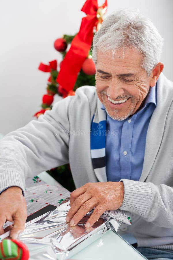 Senior Man Decorating Christmas Tree Stock Image Image of senior
