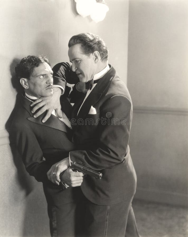 Man wrestling gun out of other man's hand royalty free stock photos Man wrestling gun out of other man's hand royalty free stock photos