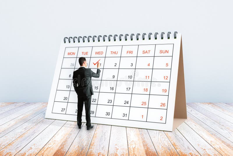 Man writing in calendar stock image. Image of april, business - 92412625