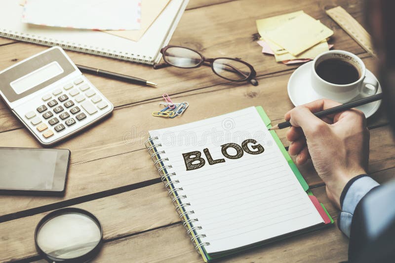 Man written blog text on notebook stock photos