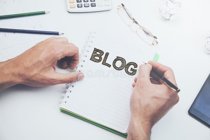 Man written blog text on notepad in office royalty free stock image