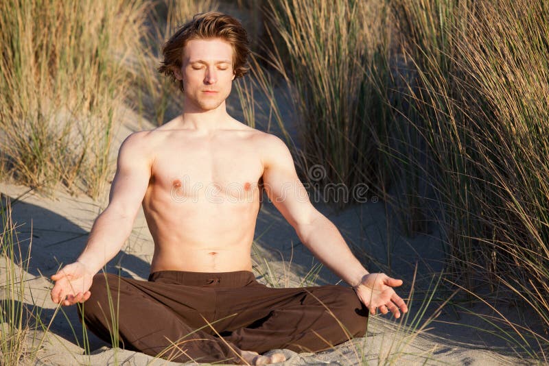 Sporty Serene Young Man Meditating Sitting in Cross-legged Yoga Lotus ...