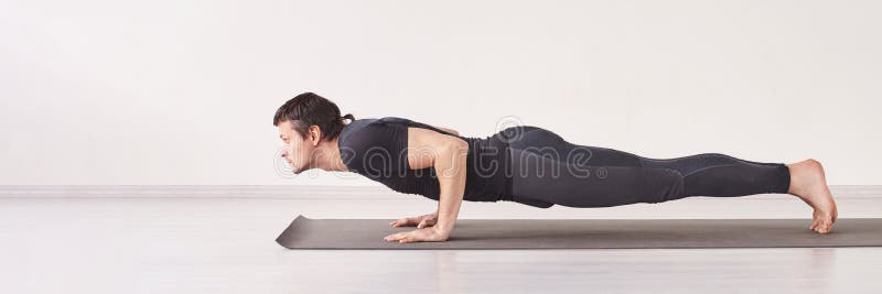 Young Attractive Woman in Chaturanga Dandasana Pose, Studio, Sid Stock  Image - Image of asana, person: 101077545