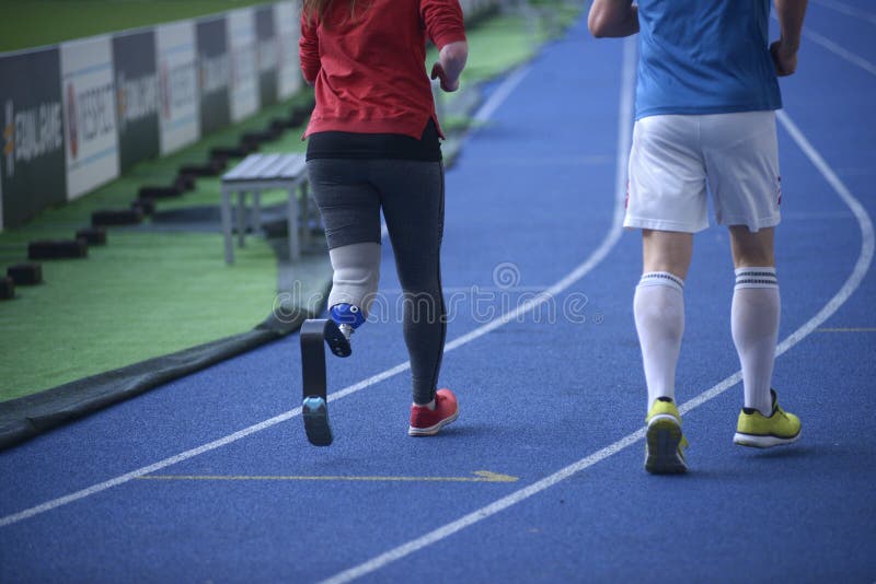 Beautiful woman with prosthesis leg Stock Photo by oneinchpunchphotos